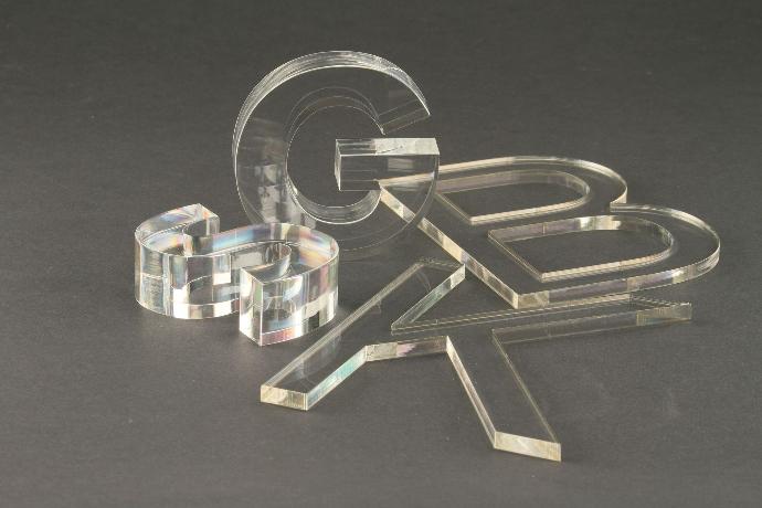 Cutting plastics and acrylics using a laser system