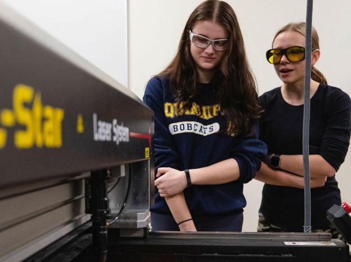 Classroom Laser Engraving Demonstration A laser engraving demonstration taking place in an educational setting, showcasing how students learn to use advanced laser technology.